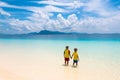 Kids playing on beach. Children play at sea