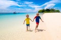 Kids playing on beach. Children play at sea Royalty Free Stock Photo