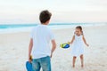 Kids playing beach tennis Royalty Free Stock Photo