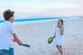 Kids playing beach tennis Royalty Free Stock Photo