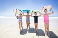 Kids playing at the beach together while on vacation Royalty Free Stock Photo