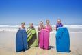 Kids playing at the beach together while on vacation Royalty Free Stock Photo