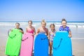 Kids playing at the beach together while on vacation Royalty Free Stock Photo