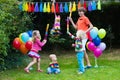 Kids playing with birthday pinata Royalty Free Stock Photo