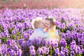 Kids playing in blooming garden with hyacinth flowers Royalty Free Stock Photo