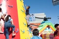 Kids playing at children inflatable playground