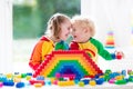 Kids playing with colorful blocks Royalty Free Stock Photo