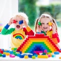 Kids playing with colorful blocks Royalty Free Stock Photo