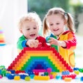 Kids playing with colorful blocks Royalty Free Stock Photo