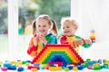 Kids playing with colorful blocks Royalty Free Stock Photo