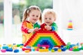 Kids playing with colorful blocks