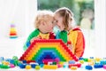 Kids playing with colorful blocks Royalty Free Stock Photo