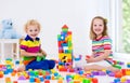 Kids playing with colorful toy blocks Royalty Free Stock Photo