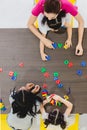 Kids playing colorful toys Royalty Free Stock Photo