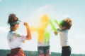 Kids playing with colours, children celebrating holi festival of colours. Children on Holi paint party. Royalty Free Stock Photo
