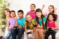 Kids playing computer games as team Royalty Free Stock Photo