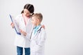 Kids playing doctors Royalty Free Stock Photo