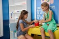 Kids playing doctors at medical office. Royalty Free Stock Photo
