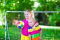 Kids playing football in school yard Royalty Free Stock Photo