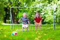 Kids playing football in school yard Royalty Free Stock Photo