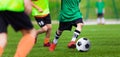 Kids Playing Football Soccer Game on Sports Field. Boys Play Soccer Match Royalty Free Stock Photo