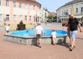 Kids playing on fountain