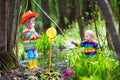 Kids playing with frog Royalty Free Stock Photo