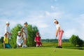 Kids playing golf