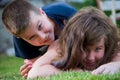 Kids playing in the grass