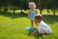 Kids playing on green grass