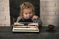 Kids playing - happy game. business kid or small boy or businessman child with typewriter Royalty Free Stock Photo