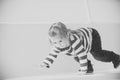 Kids playing - happy game. Little boy child playing on white yacht.