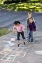 Kids playing hopscotch Royalty Free Stock Photo