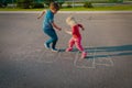 Kids playing hopscotch outside, boy and girl have fun Royalty Free Stock Photo