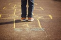 Kids playing hopscotch on playground outdoors. Hopscotch popular street game Royalty Free Stock Photo
