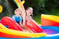 Kids playing in inflatable swimming pool