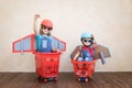 Kids playing with jet pack at home Royalty Free Stock Photo