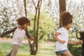 Kids playing outdoors with friends Royalty Free Stock Photo