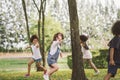 Kids playing outdoors with friends Royalty Free Stock Photo