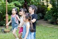 Kids playing outdoors with friends. little children play at nature park. Royalty Free Stock Photo