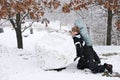 Kids Playing Outside in the Snow and Making a Huge Snowball