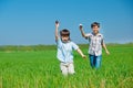 Kids playing with paper airplanes