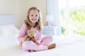 Kids in bed. Children in pajamas. Family bedroom. Royalty Free Stock Photo