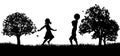 Kids Playing in the Park Silhouette Royalty Free Stock Photo