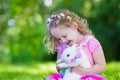 Kids playing with pet rabbit Royalty Free Stock Photo