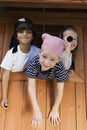 Kids Playing In Playhouse