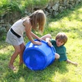 Kids playing with a pock Royalty Free Stock Photo