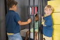 Kids playing police and prisoner.