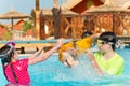 Kids playing in the pool Royalty Free Stock Photo