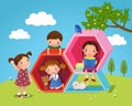 Kids playing and reading with hexagon shaped in the yard